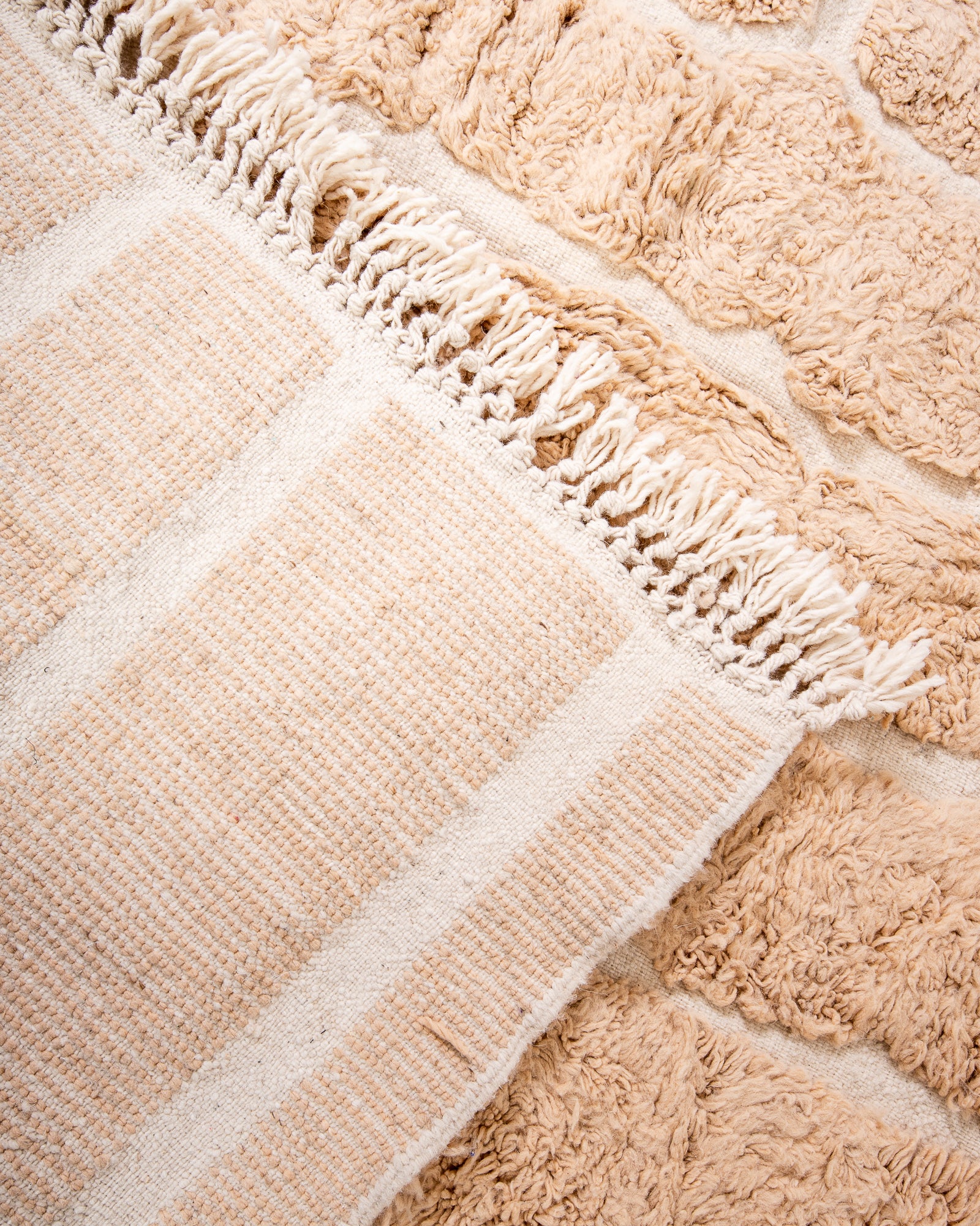 Modern, designer, handcrafted Berber rug from Morocco. Beniourain carpet with beautiful colours and patterns and fluffy wool texture.